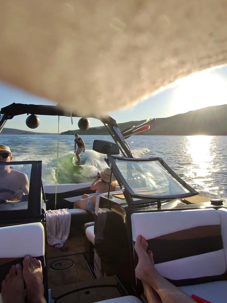 Golden-hour wakesurf session on the lake